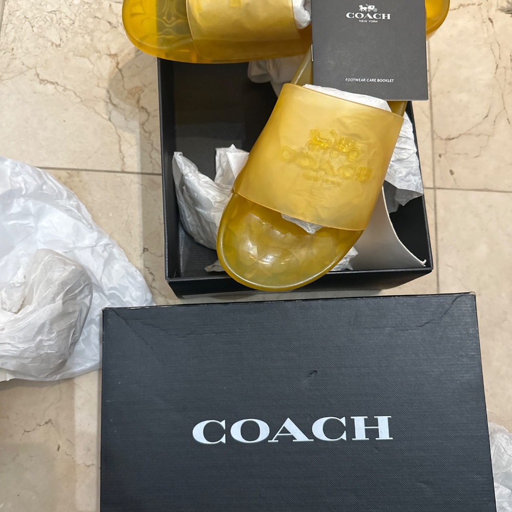 Coach ulyssa rubber slide.                Buttercup new 8B